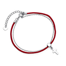 Srebrna pr.925 bransoletka z czerwonym sznurkiem - krzyżyk